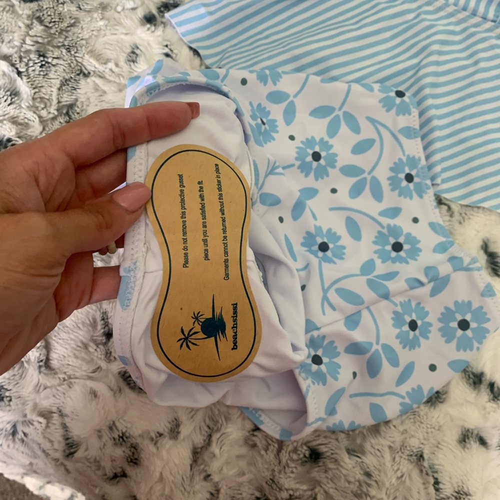 Cute swim suit, never worn. Still has tags & liner